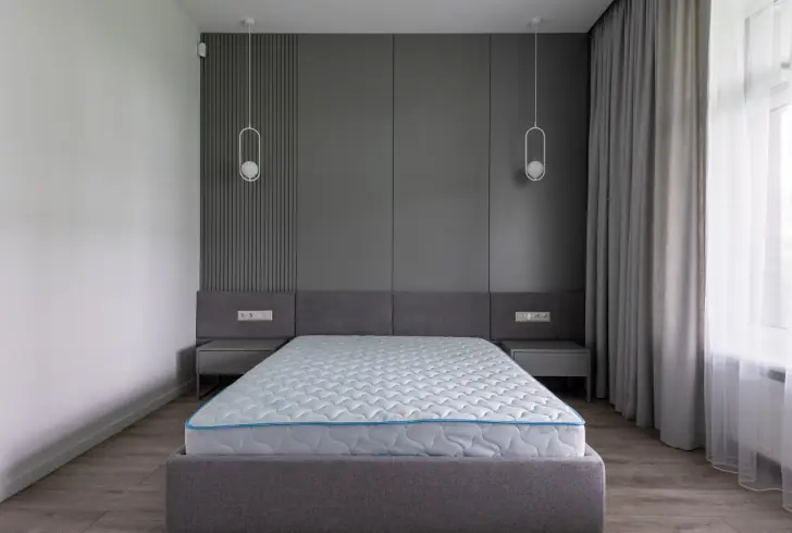 Mattress with tufting buttons visible